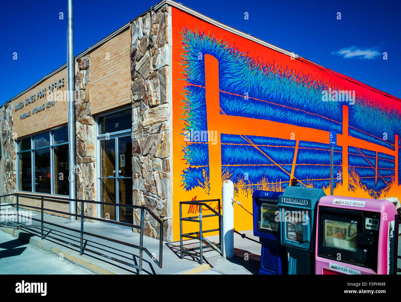 Colorful exterior wall mural by Artist David Klaren; US Post Office; Pinedale; Wyoming; USA Stock Photo
