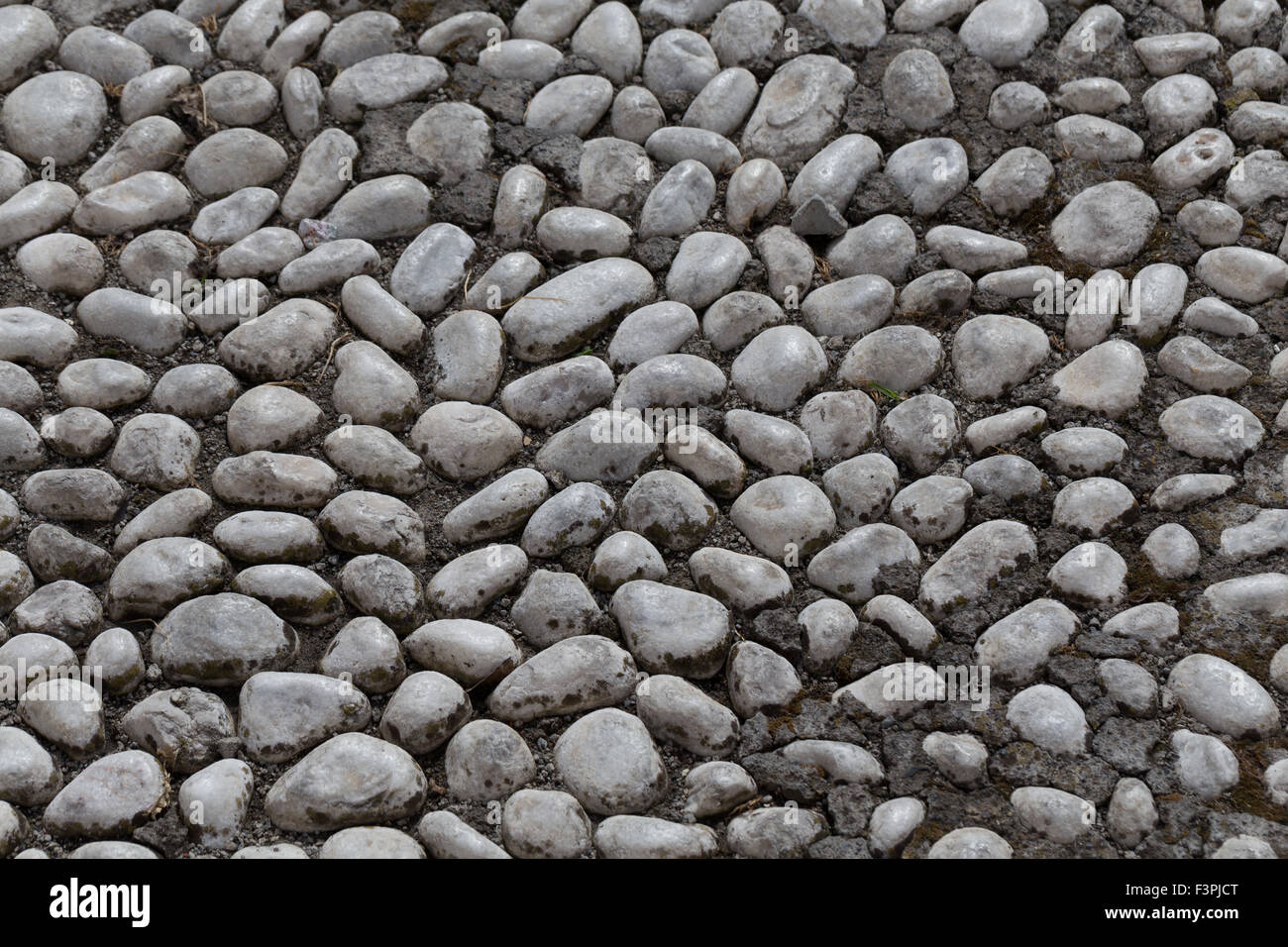 Floor walkway made of small pebbles Stock Photo Alamy