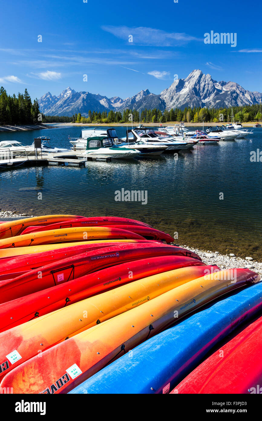 Teton Range; colorful boats; Colter Bay Marina; Jackson Lake; Grand Teton National Park; Wyoming; USA Stock Photo