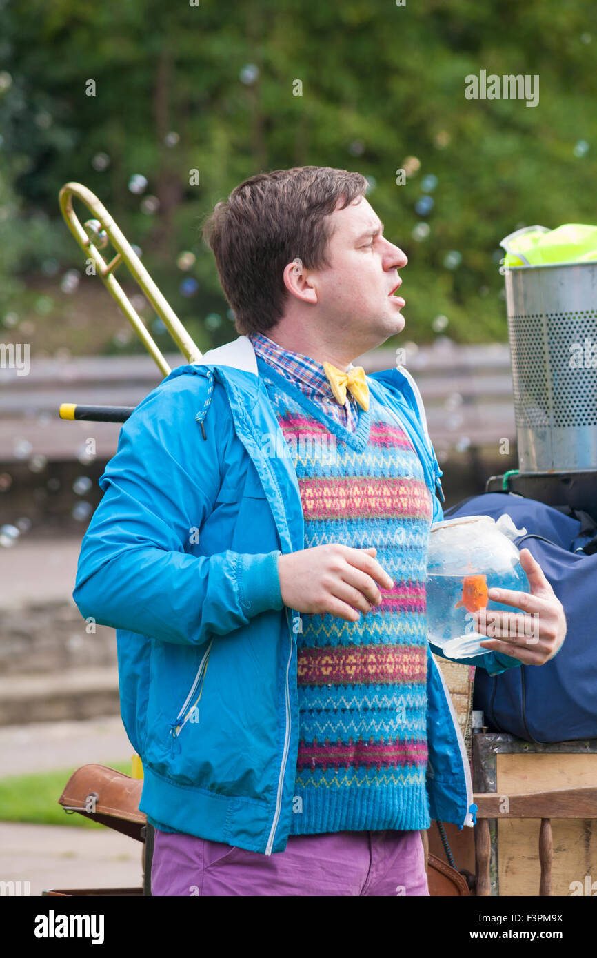 Bournemouth, Dorset, UK. 11 October 2015. Bournemouth Arts by the Sea Festival returns for a fifth year with festival entertainment. Ramshacklicious present Mother Says. Jack should be at home with his overbearing mum, but has made a break for freedom with his homemade music cart. He discovers the world for the first time and shares his cautionary tales his mother has been filling his head with. Health and safety Credit:  Carolyn Jenkins/Alamy Live News Stock Photo