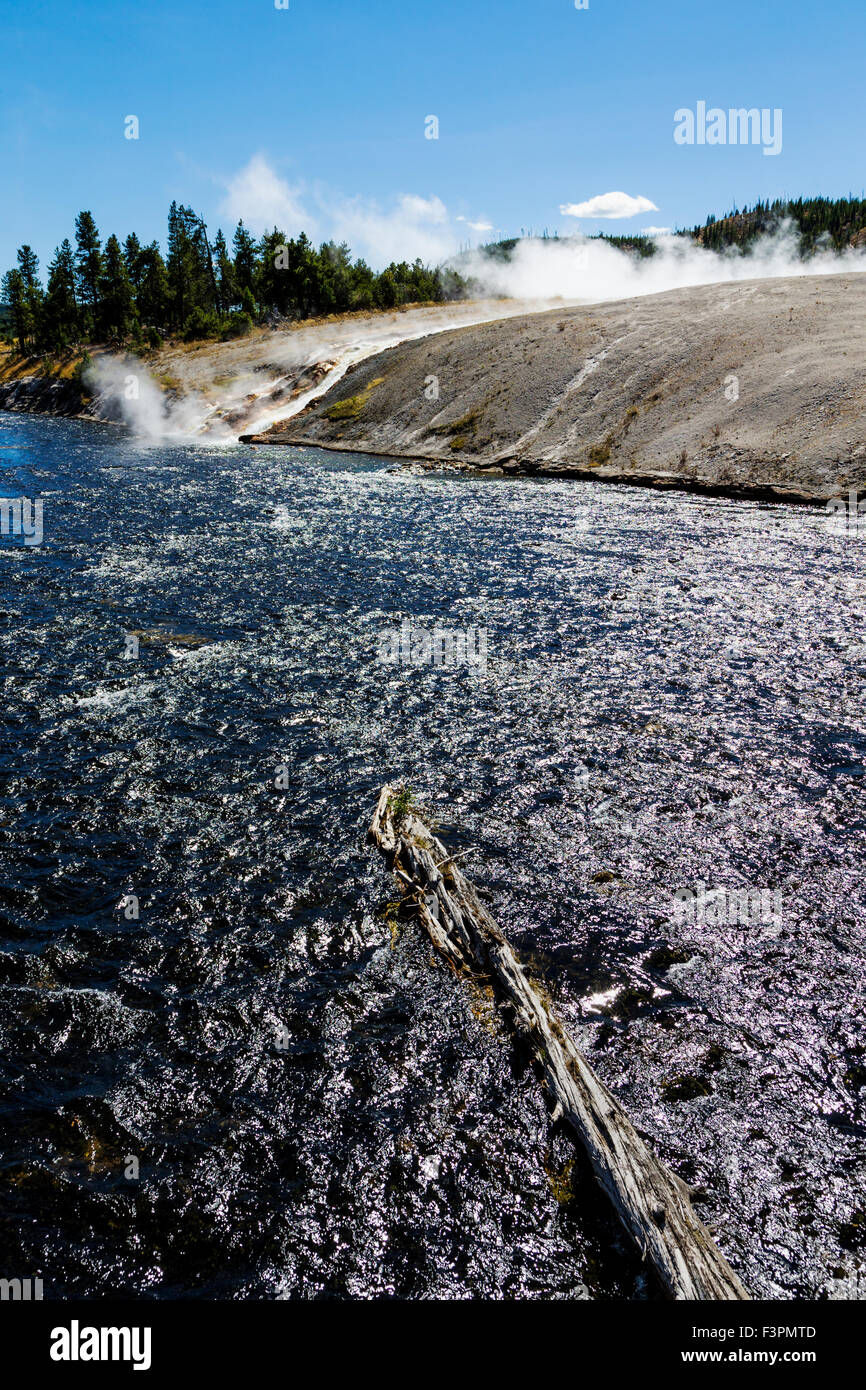 Midway Geyser Basin; hot springs flow to Firehole River; Yellowstone National Park, Wyoming, USA Stock Photo