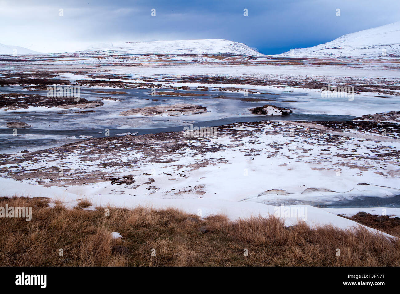 Wide lens capture of volcanic mountain landscape in wintertime, Iceland Stock Photo