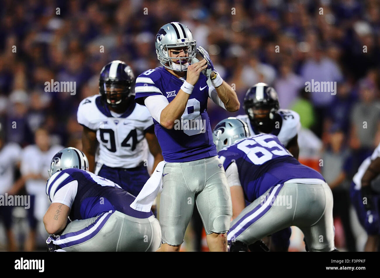 Manhattan, Kansas, USA. 10th Oct, 2015. Kansas State Wildcats quarterback Joe Hubener (8) calls a time out in the first half as the play clock runs down during the NCAA Football game between the TCU Horned Frogs and Kansas State Wildcats at Bill Snyder Family Stadium in Manhattan, Kansas. Kendall Shaw/CSM/Alamy Live News Stock Photo