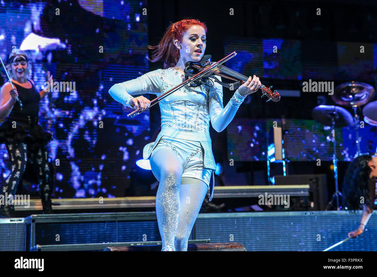 Music Artist LINDSEY STIRLING performs at the Red Hat Amphitheater in North Carolina.  Lindsey Stirling (born September 21, 1986) is an American violinist, dancer, performance artist, and composer. She presents choreographed violin performances, both live and in music videos found on her YouTube channel, Lindsey Stirling, which she introduced in 2007. Stock Photo