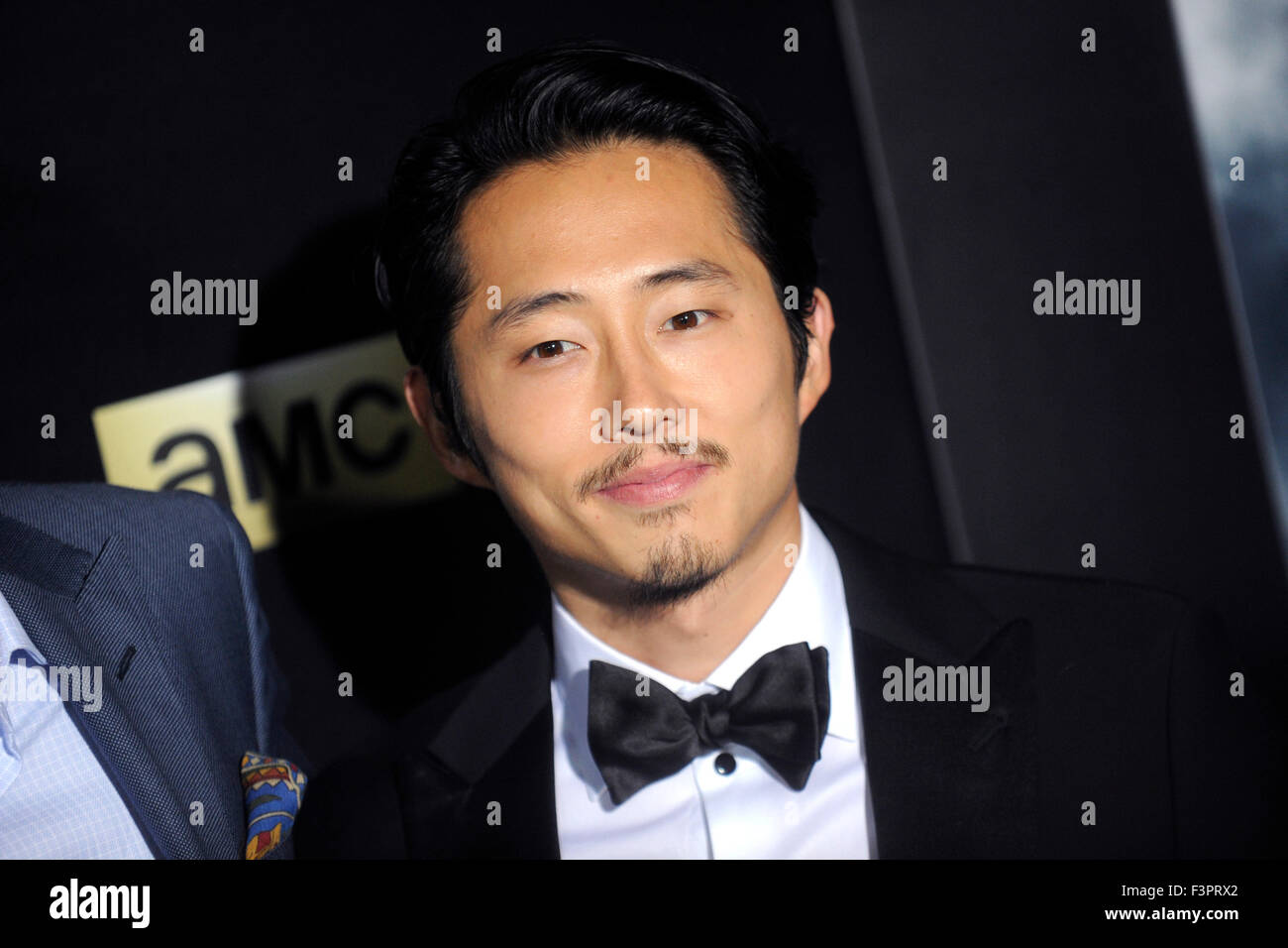 New York City. 9th Oct, 2015. Steven Yeun attends AMC's 'The Walking Dead' Season 6 Fan Premiere Event 2015 at Madison Square Garden on October 9, 2015 in New York City. © dpa/Alamy Live News Stock Photo