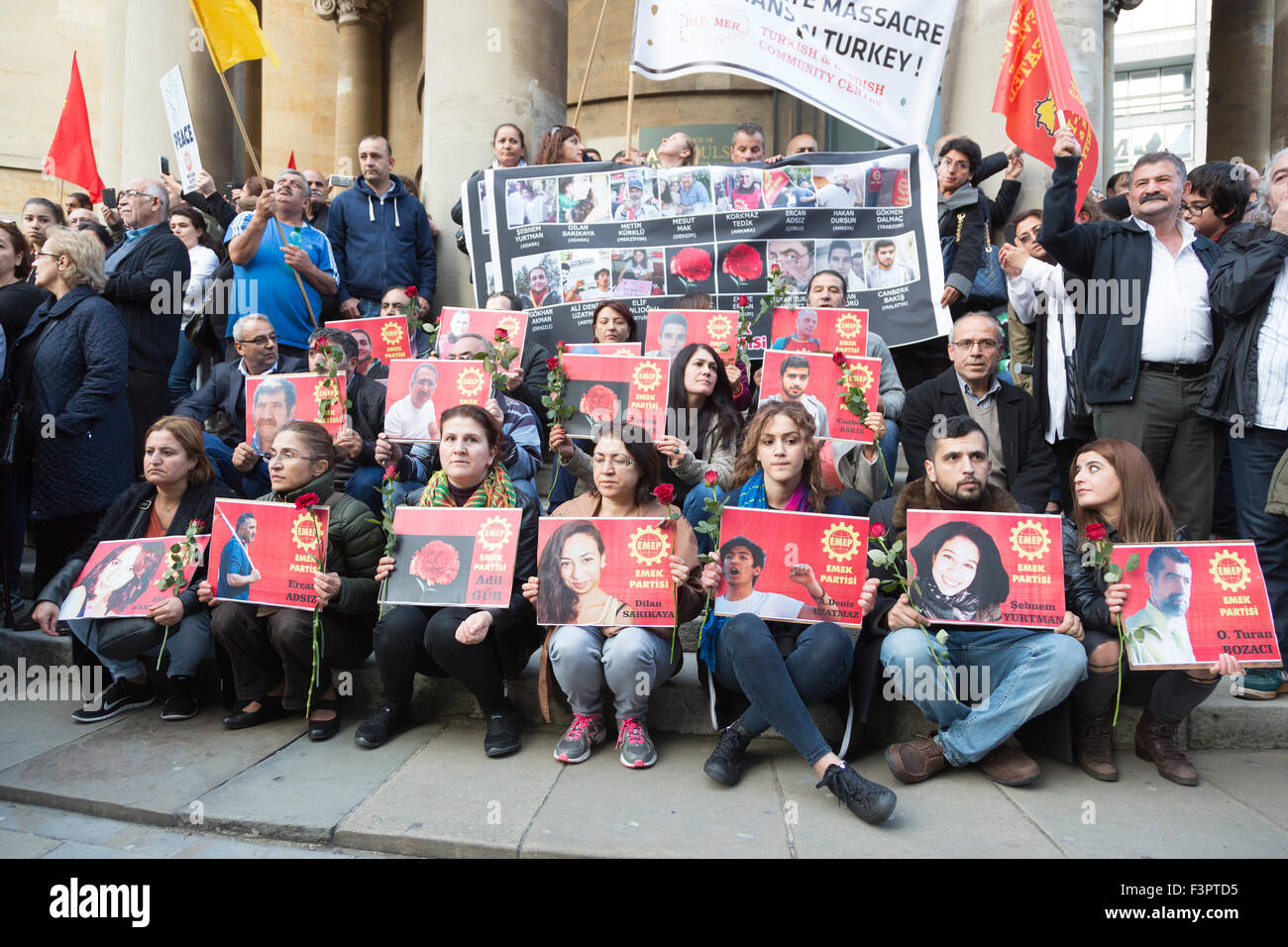 London, UK. 11/10/2015. Members of Emek Partisi (EMEP) hold up photos of people killed by the bombs in Ankara. Several thousand Kurds and Turks marched from Downing Street to the BBC headquarters at Langham Place, to protest against the bombs in Ankara that killed many people attending a peace demonstration. Credit:  Nick Savage/Alamy Live News Stock Photo