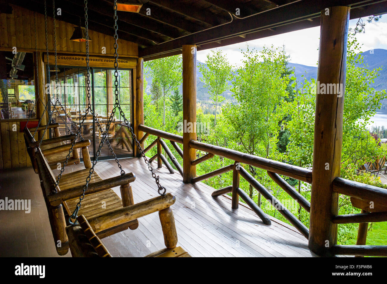 View from porch & wooden swing seats; historic Grand Lake Lodge; near Rocky Mountain National Park; Colorado; USA Stock Photo