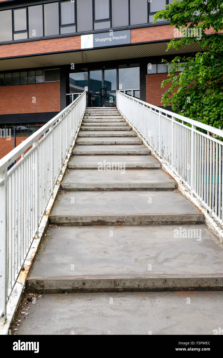 Stairs leading to precinct shopping centre, Oxford Road, The University of Manchester, UK Stock Photo
