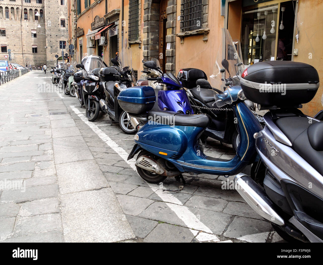 Italy, Emilia-Romagna region, Bologna - parked velos, motor scooters. Stock Photo