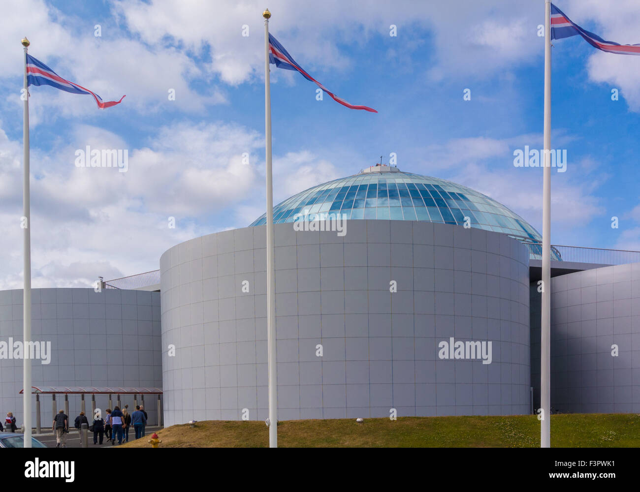 Reykjavik, Iceland. 29th July, 2015. Tour buses carrying tourists arrive at The Perlan (The Pearl), a landmark building in Reykjavik, capital of Iceland, on Oskjuhlio hill. Above the hot water storage tanks is a futuristic revolving glass-domed restaurant and viewing deck, a favorite tourist destination. © Arnold Drapkin/ZUMA Wire/Alamy Live News Stock Photo