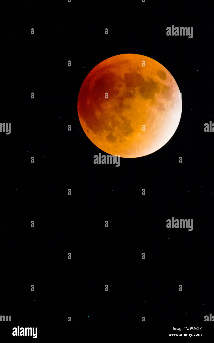 Rare Total Lunar Eclipse of a Super Full Moon over Rocky Mountains