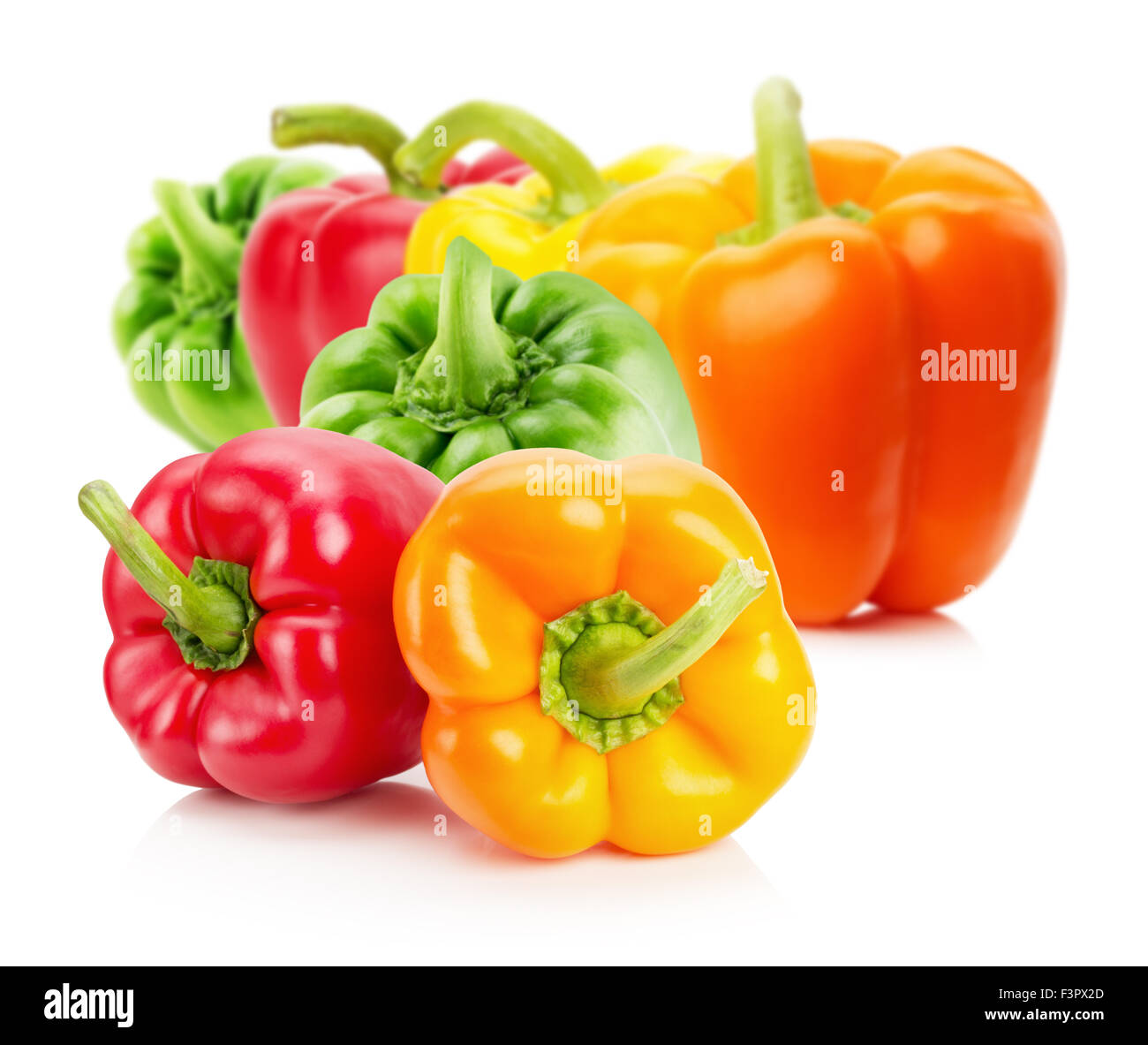 red, yellow and green pepper isolated on the white background. Stock Photo
