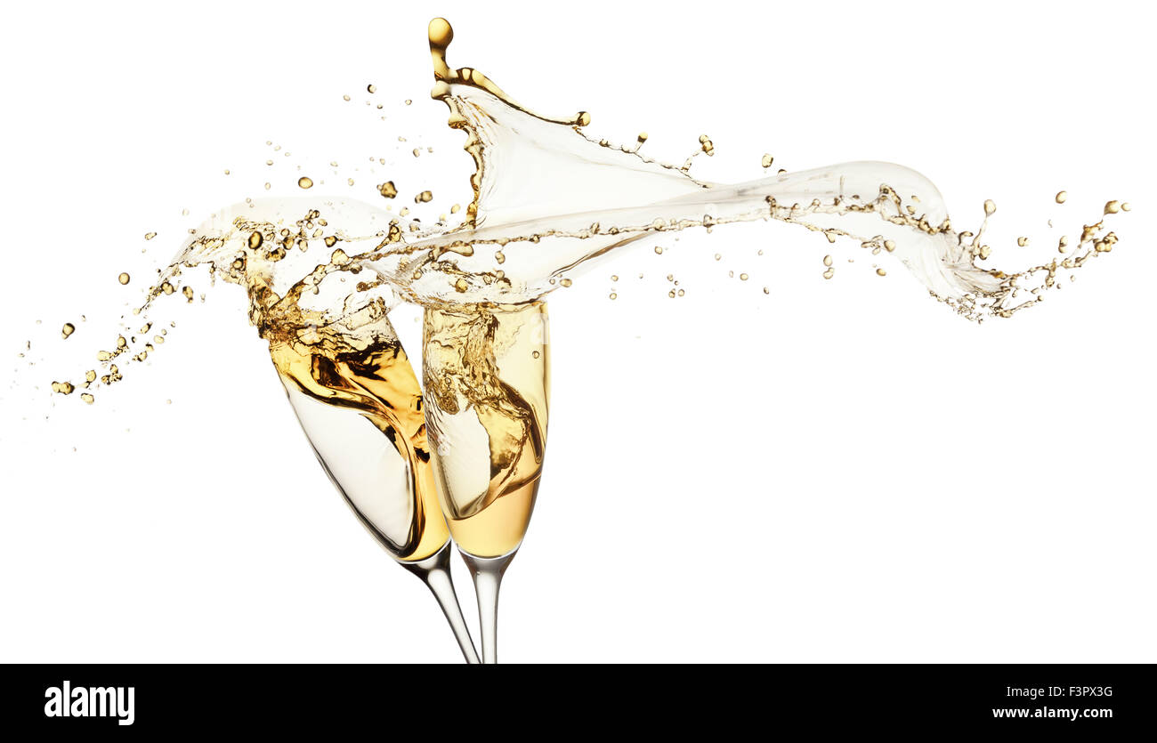 champagne splashes from glasses isolated on the white background. Stock Photo