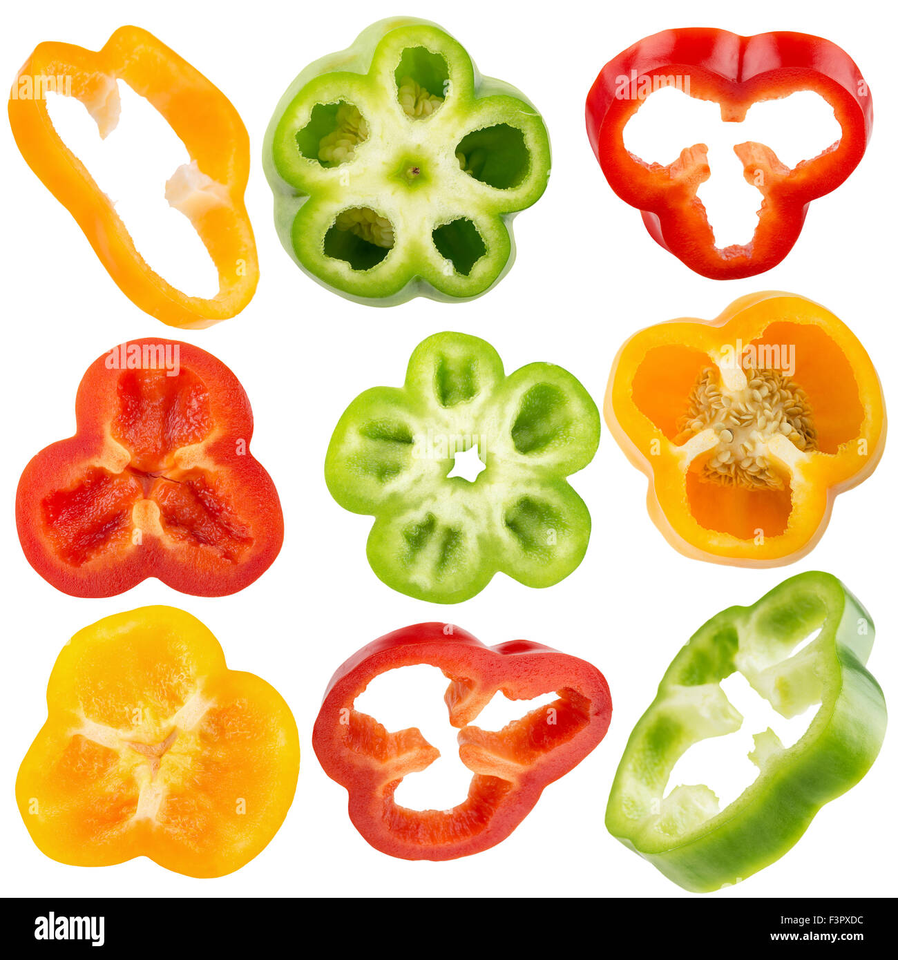 collection of red, yellow, green pepper slices isolated on the white background. Stock Photo