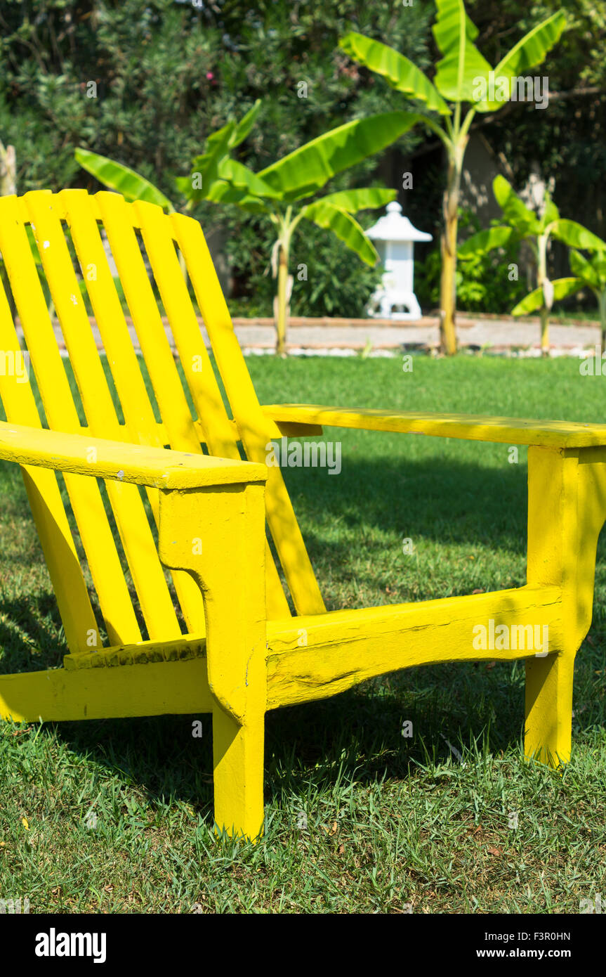 Bright Color Wooden Sun Chairs In The Beach Garden Stock Photo