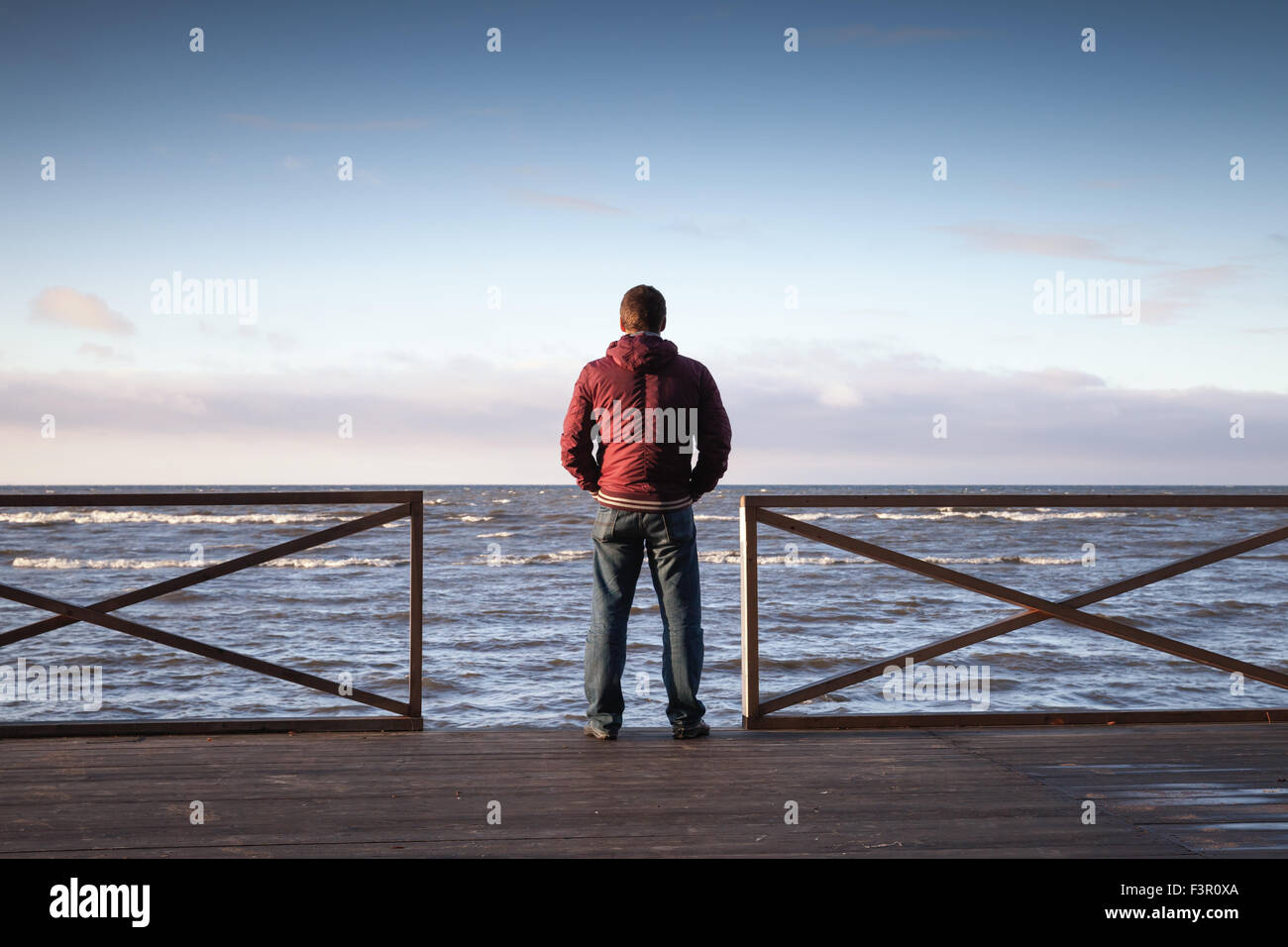 Back view young man silhouette hi-res stock photography and images - Alamy
