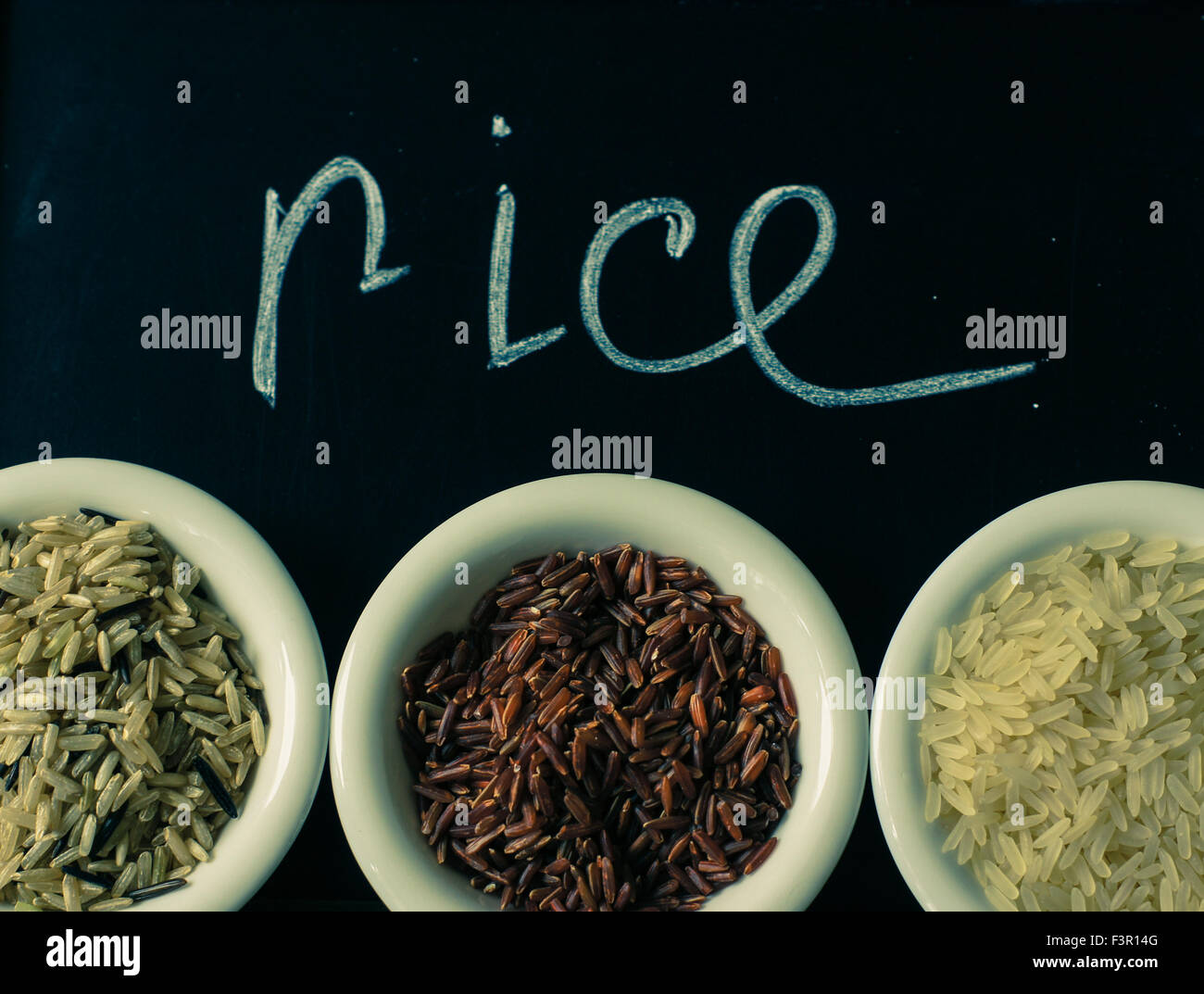 Different Kinds Of Rice In The Pots On The Rustic Table Stock Photo Alamy Different kinds of rice in the pots on the rustic table stock photo alamy