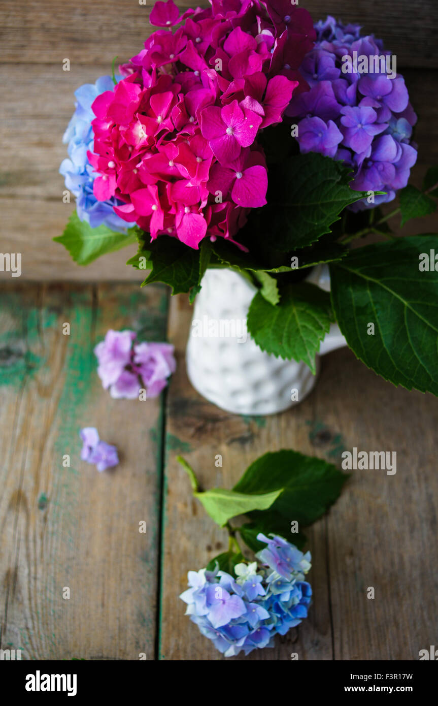 Pastel color hydrangea flowers on wooden table Stock Photo Alamy