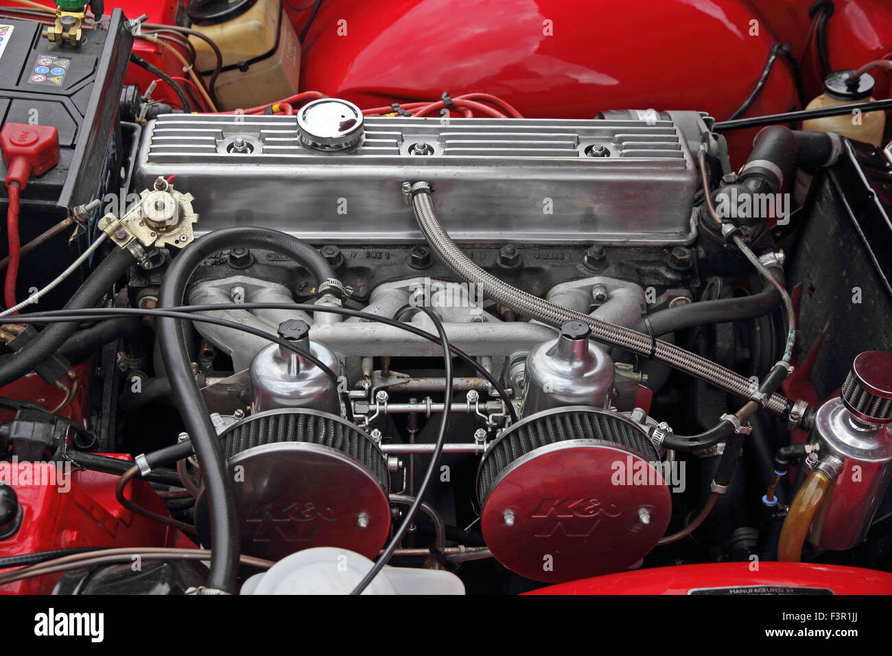 Engine compartment of red 1970 Triumph TR6 sports car Stock Photo - Alamy