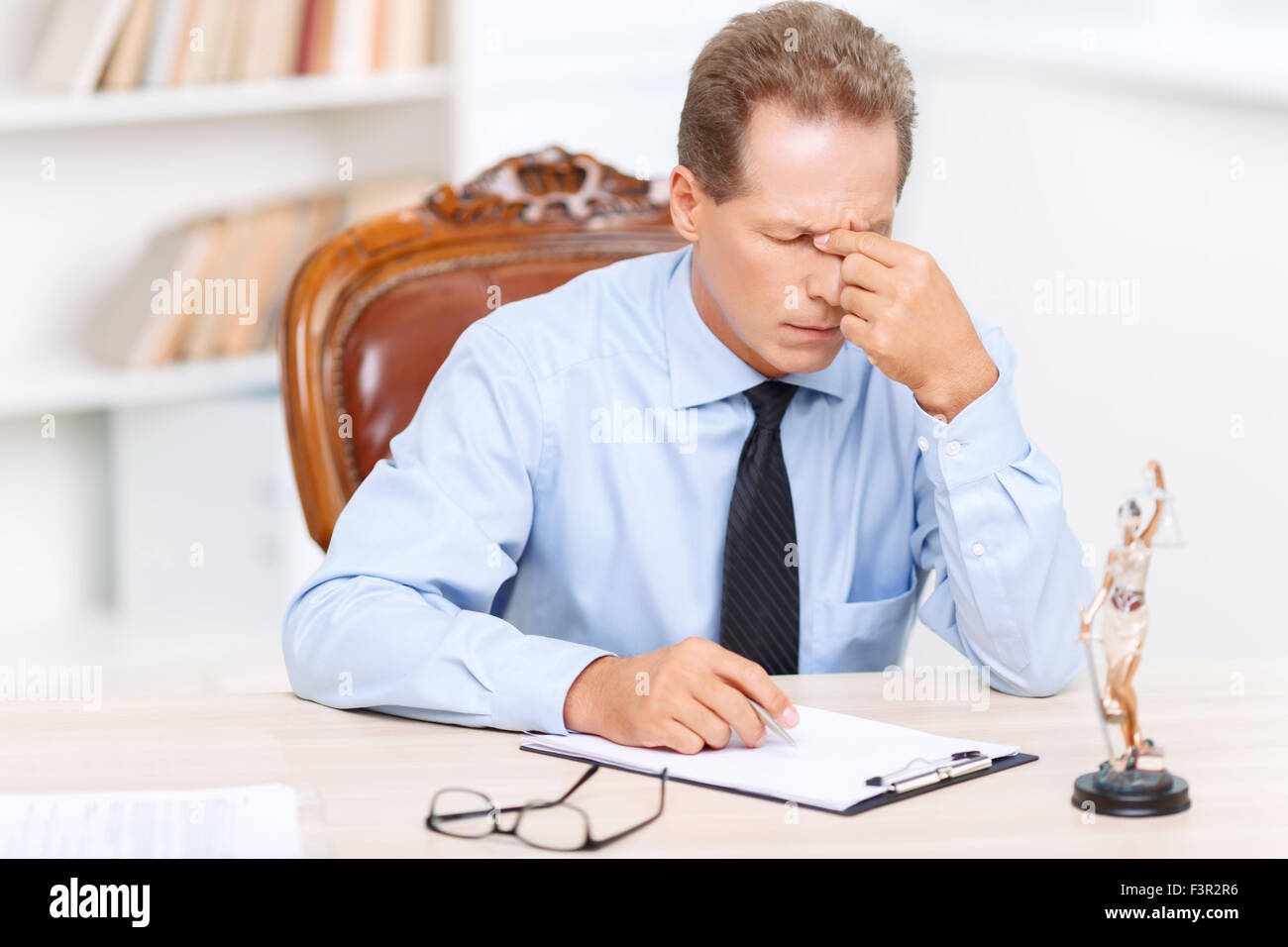 Professional lawyer sitting at the table Stock Photo Alamy