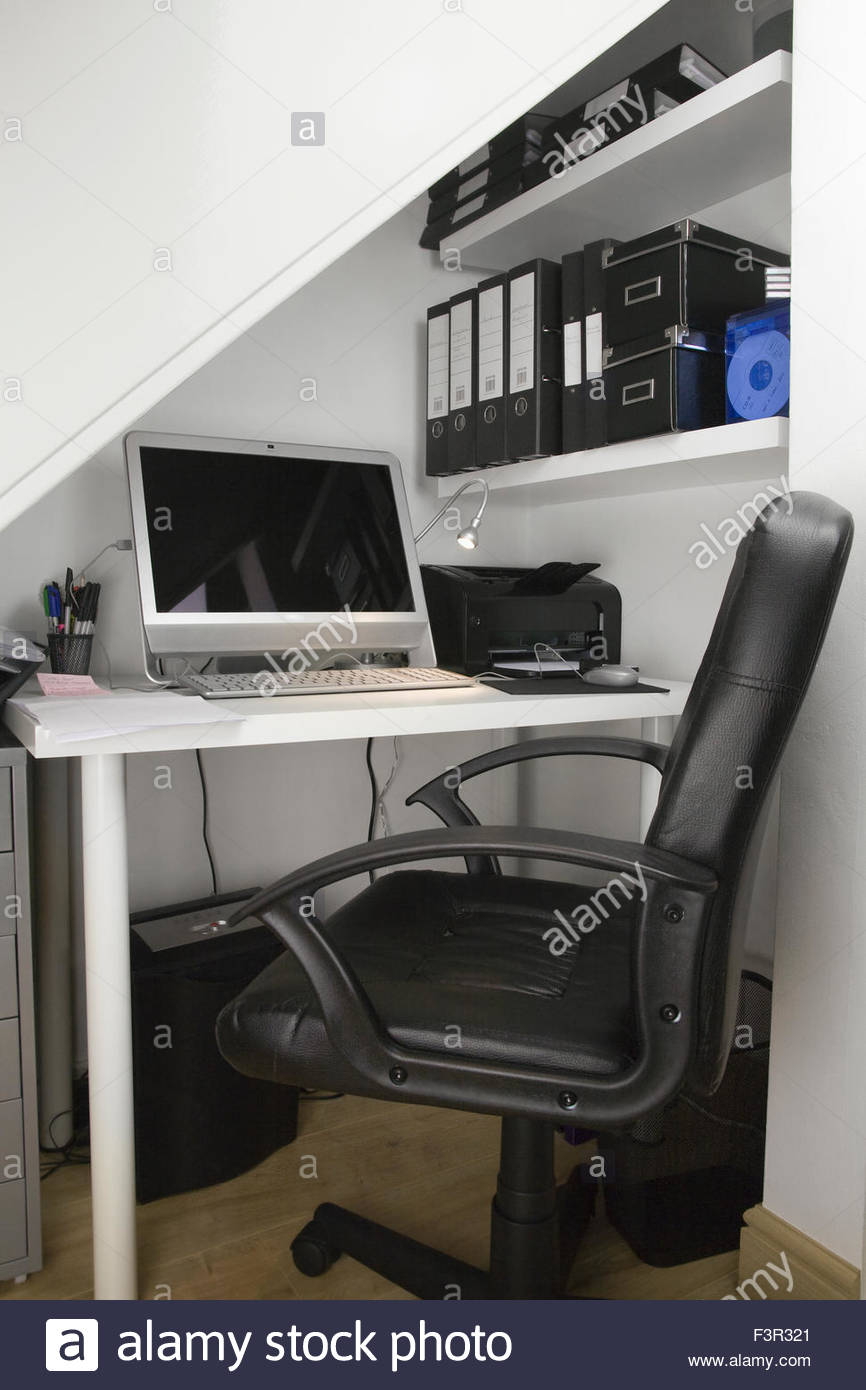 Home Office Interior Set Up With A Desktop Computer And Printer