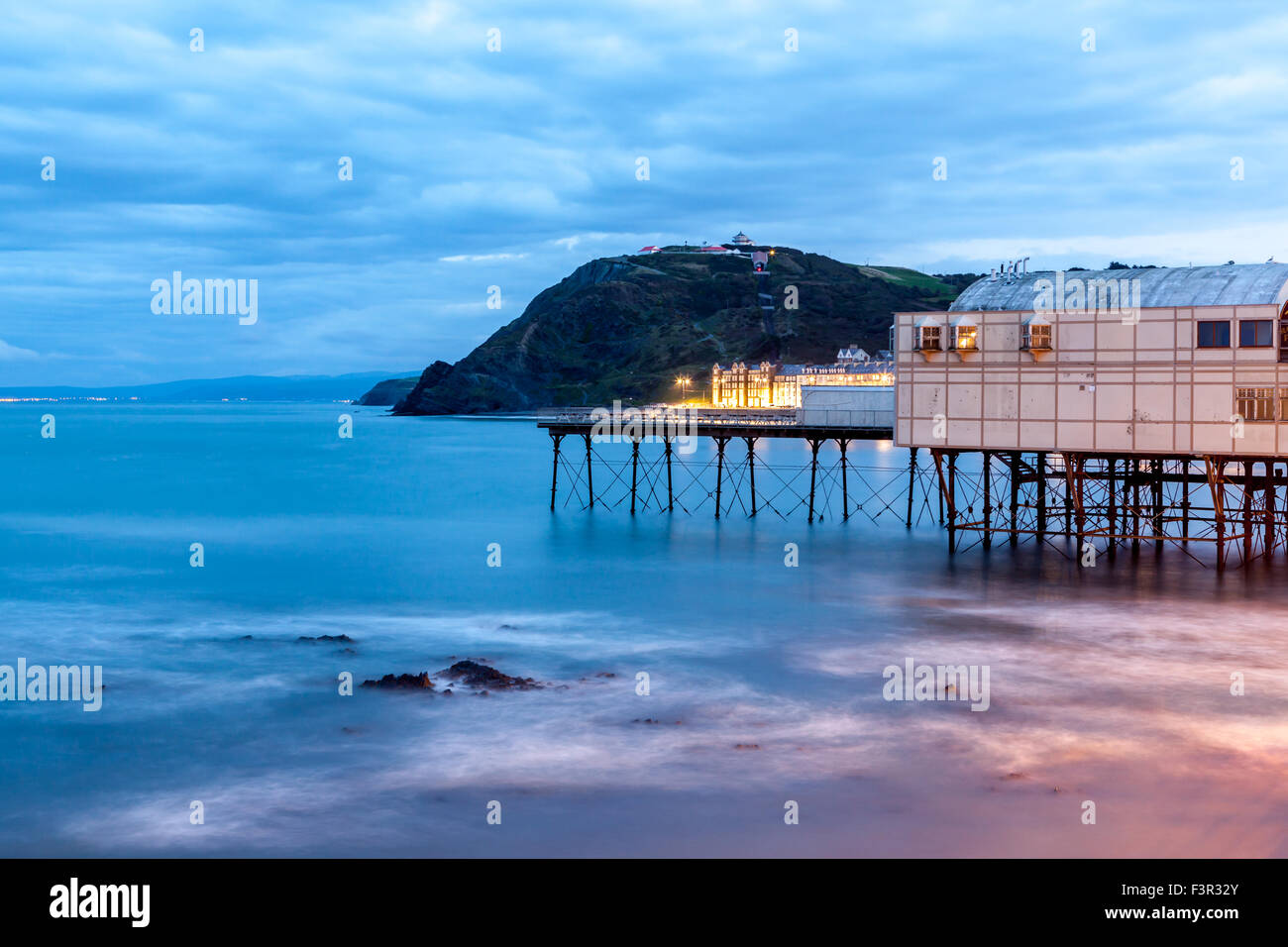 Aberystwyth at dawn showing the pier and cliff railway in the