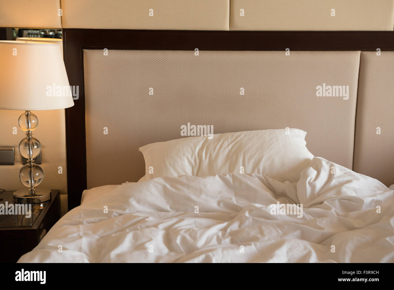 bed in a hotel room in the morning Stock Photo Alamy