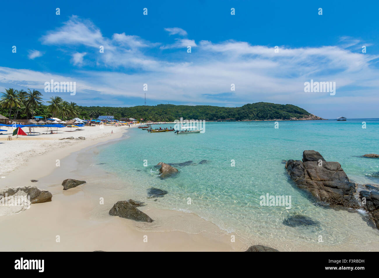 Beach with clear water and blue skies Stock Photo - Alamy