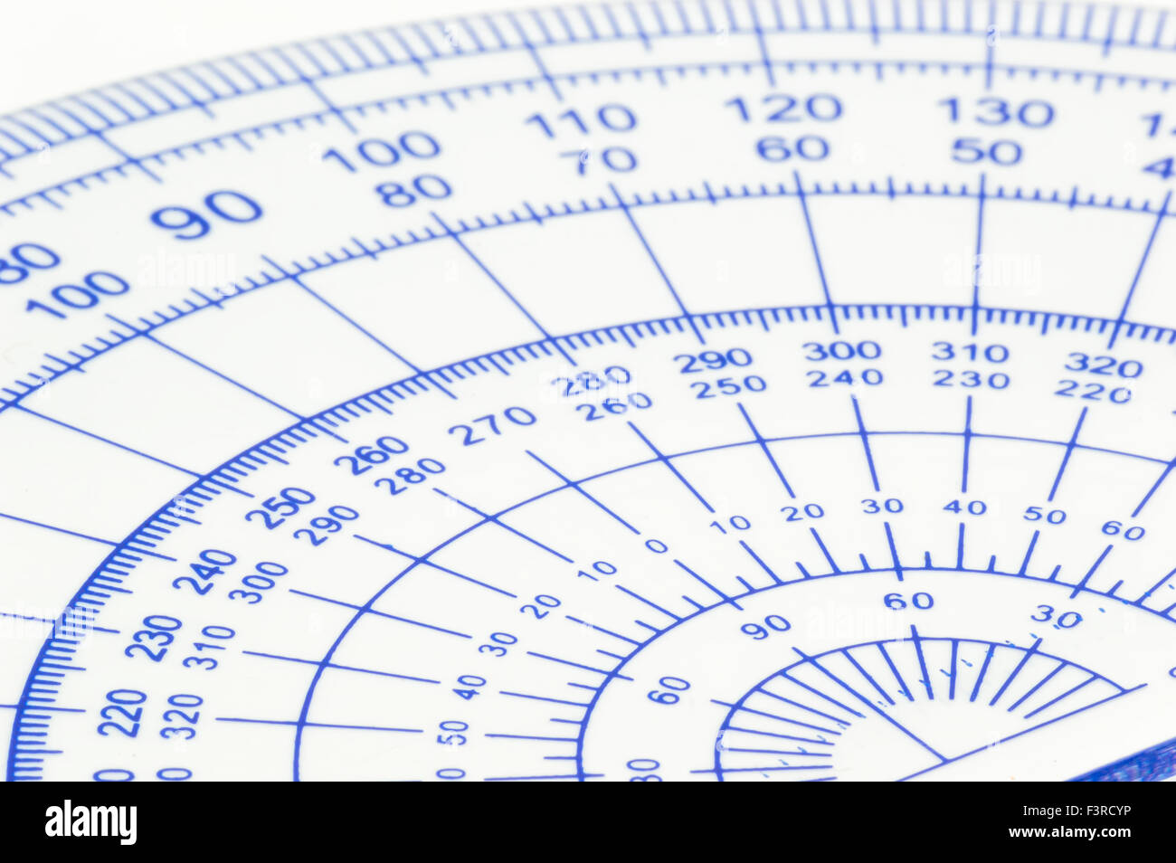 Geometry ruler macro isolated white background Stock Photo - Alamy