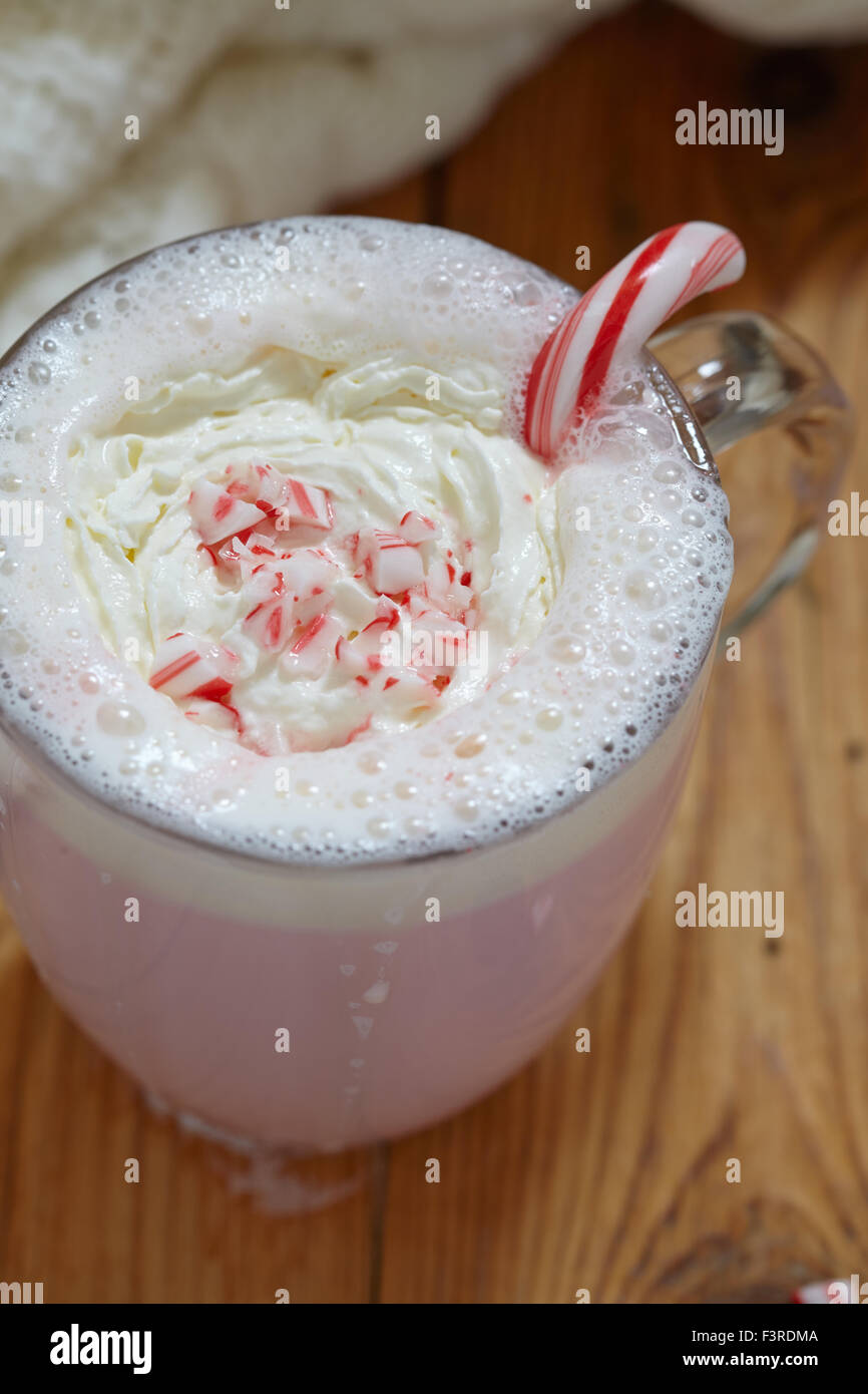 White hot chocolate with peppermint canes Stock Photo