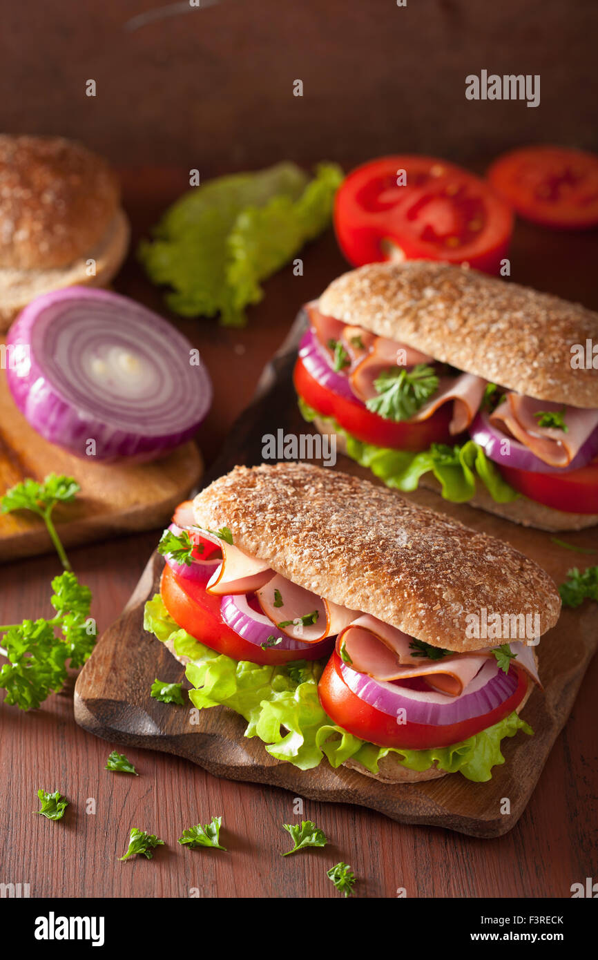 ham sandwich with tomato onion lettuce Stock Photo - Alamy