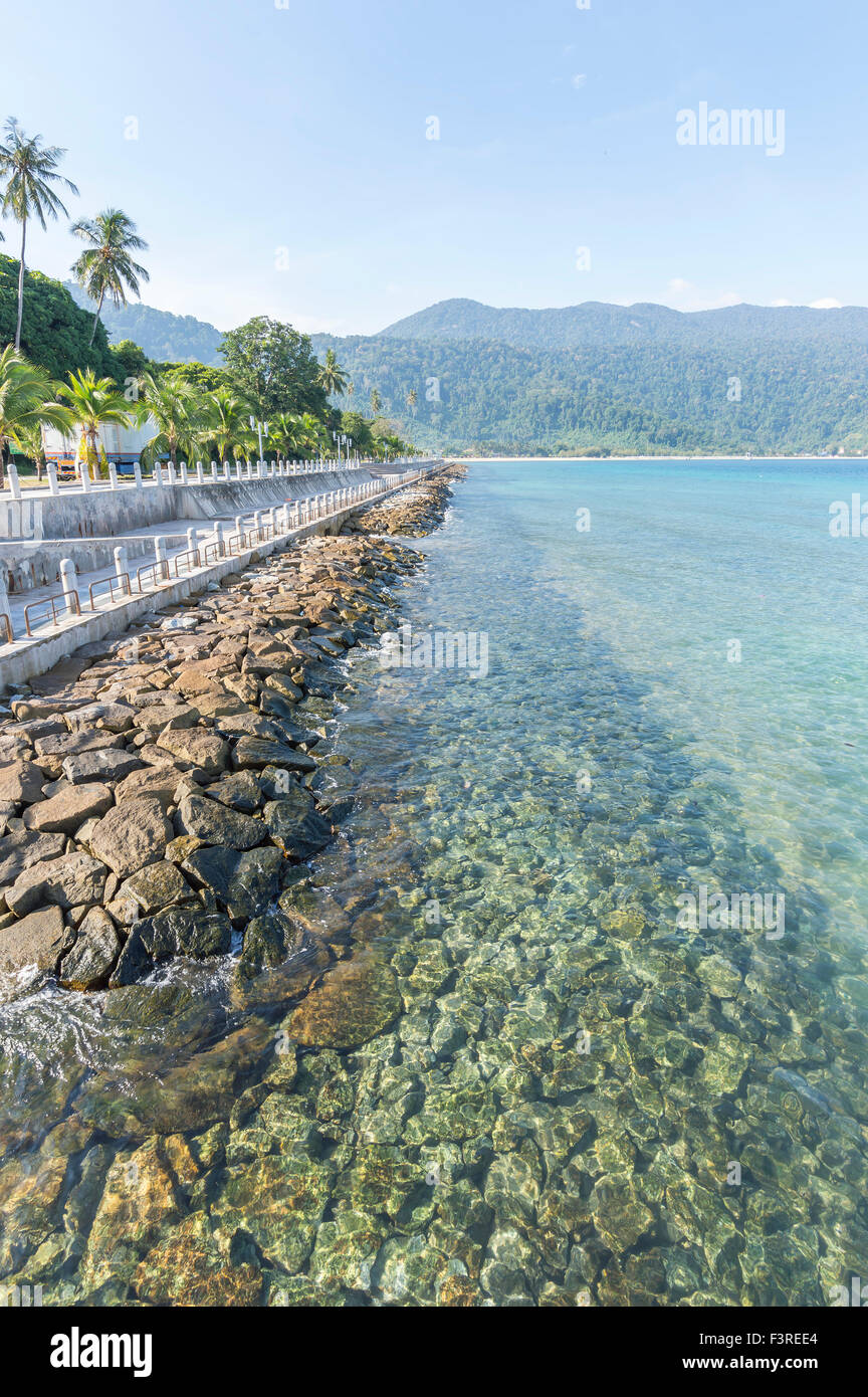 Beach rock with clear water Stock Photo - Alamy
