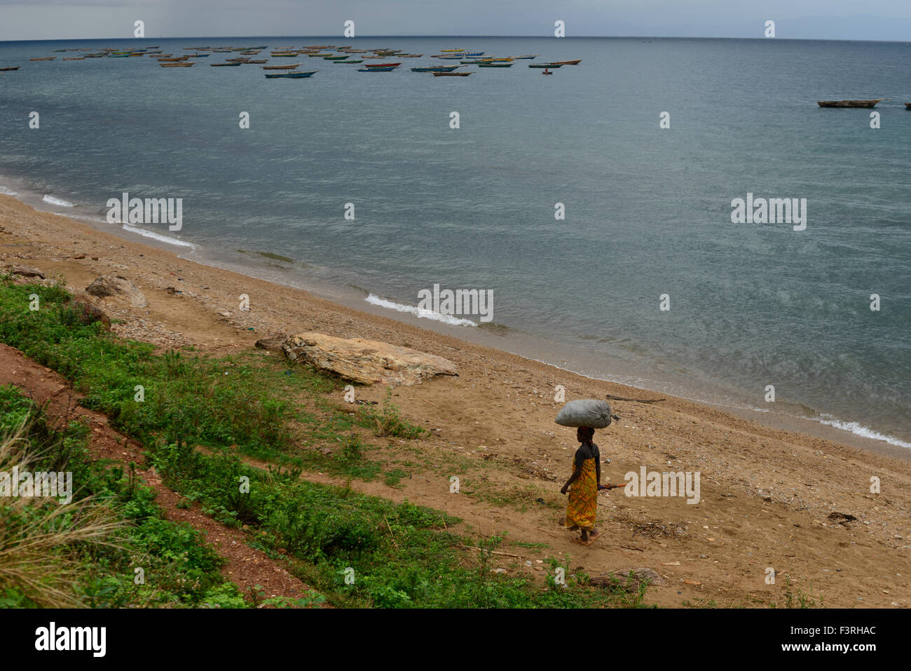 Woman on the shore of Lake Tanganyika, Burundi, Africa Stock Photo