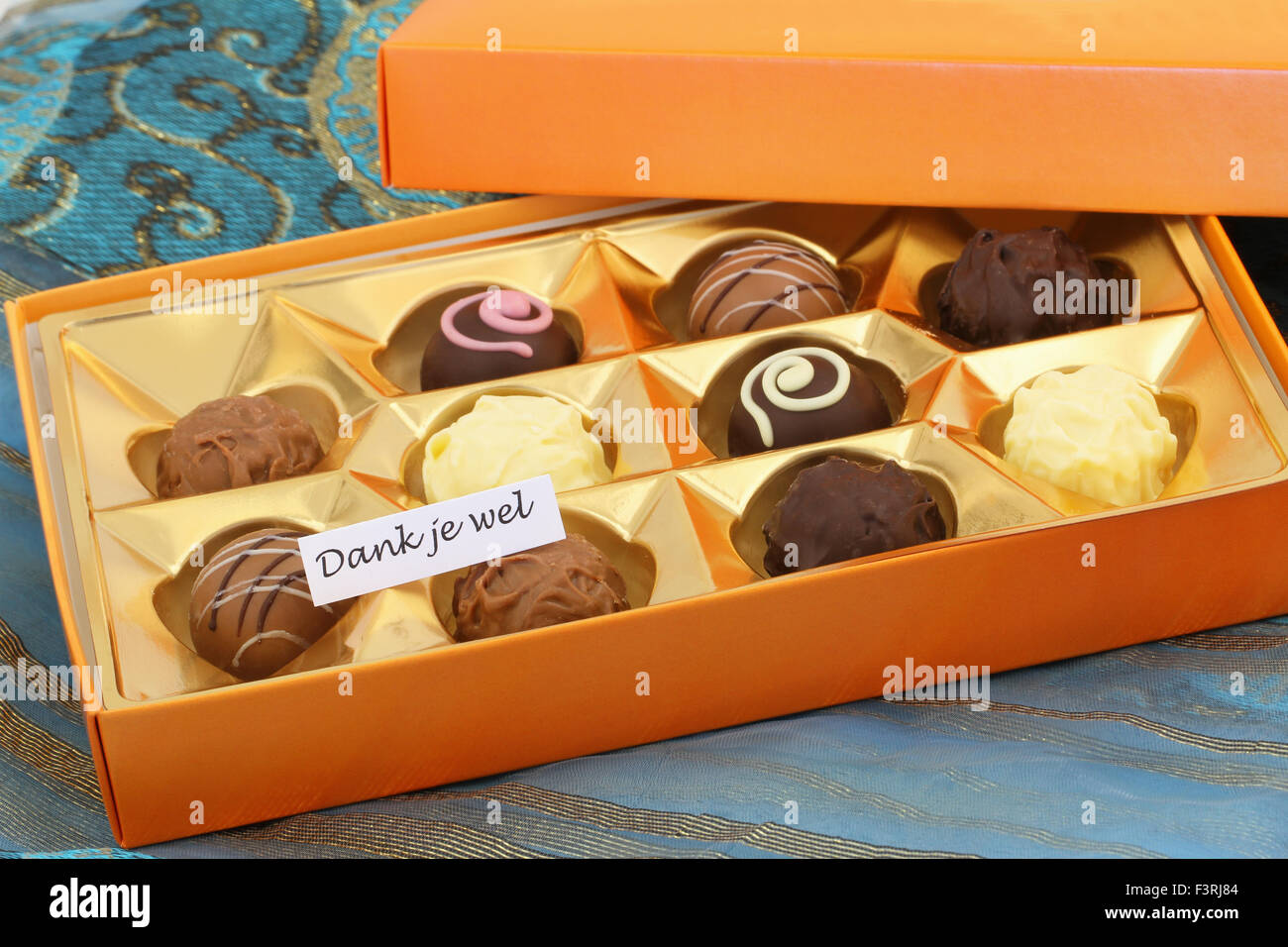 Dank je wel (which means thank you in Dutch) with box of chocolates and pralines Stock Photo Alamy