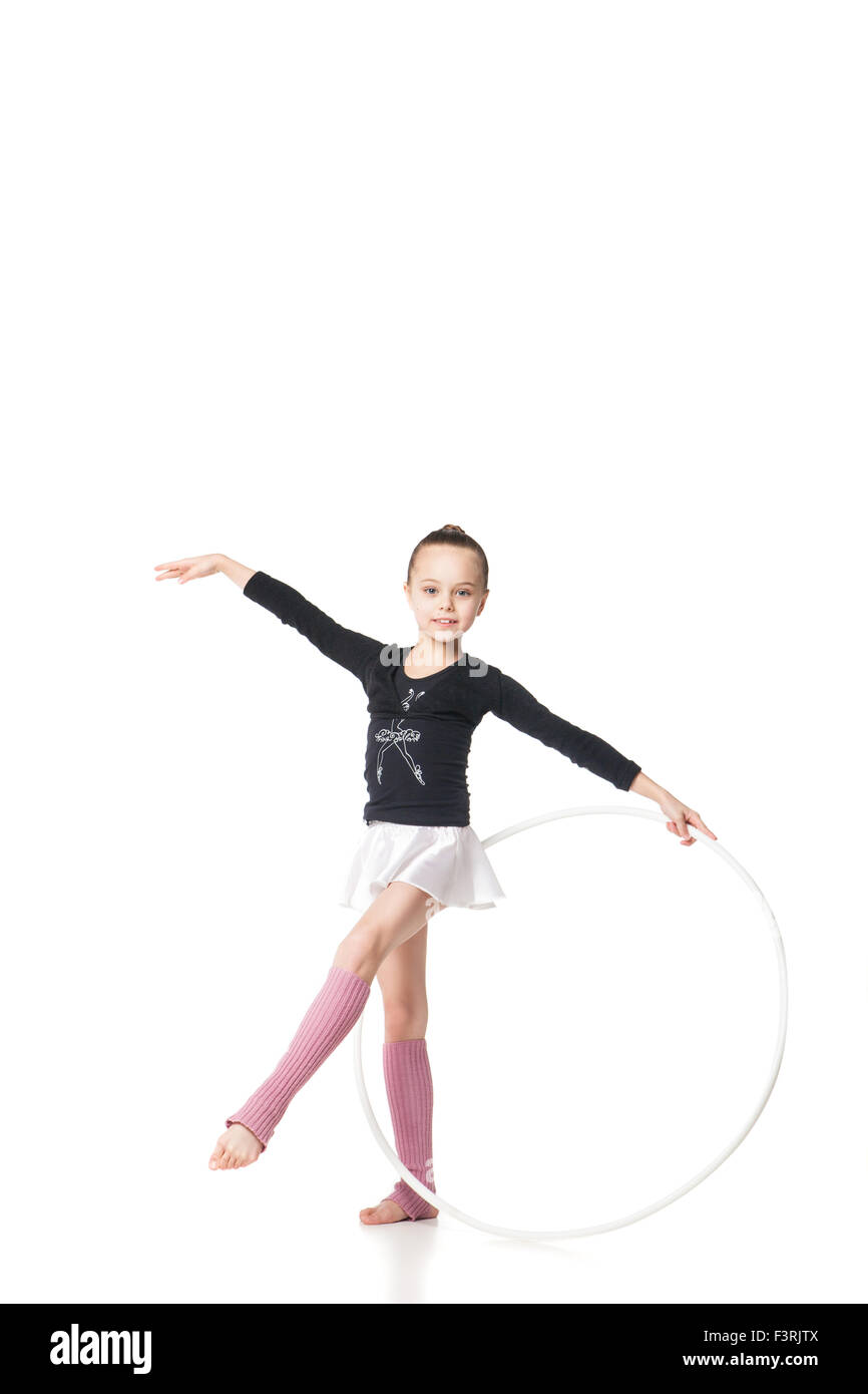Beautiful little gymnast with the hoop Stock Photo - Alamy
