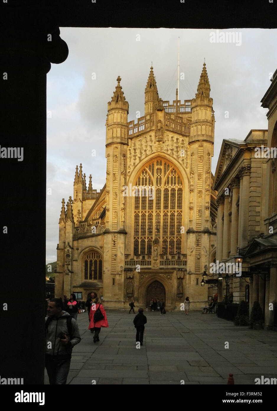 The golden Bath stone of Bath Abbey glows in the afternoon sun. Stock Photo