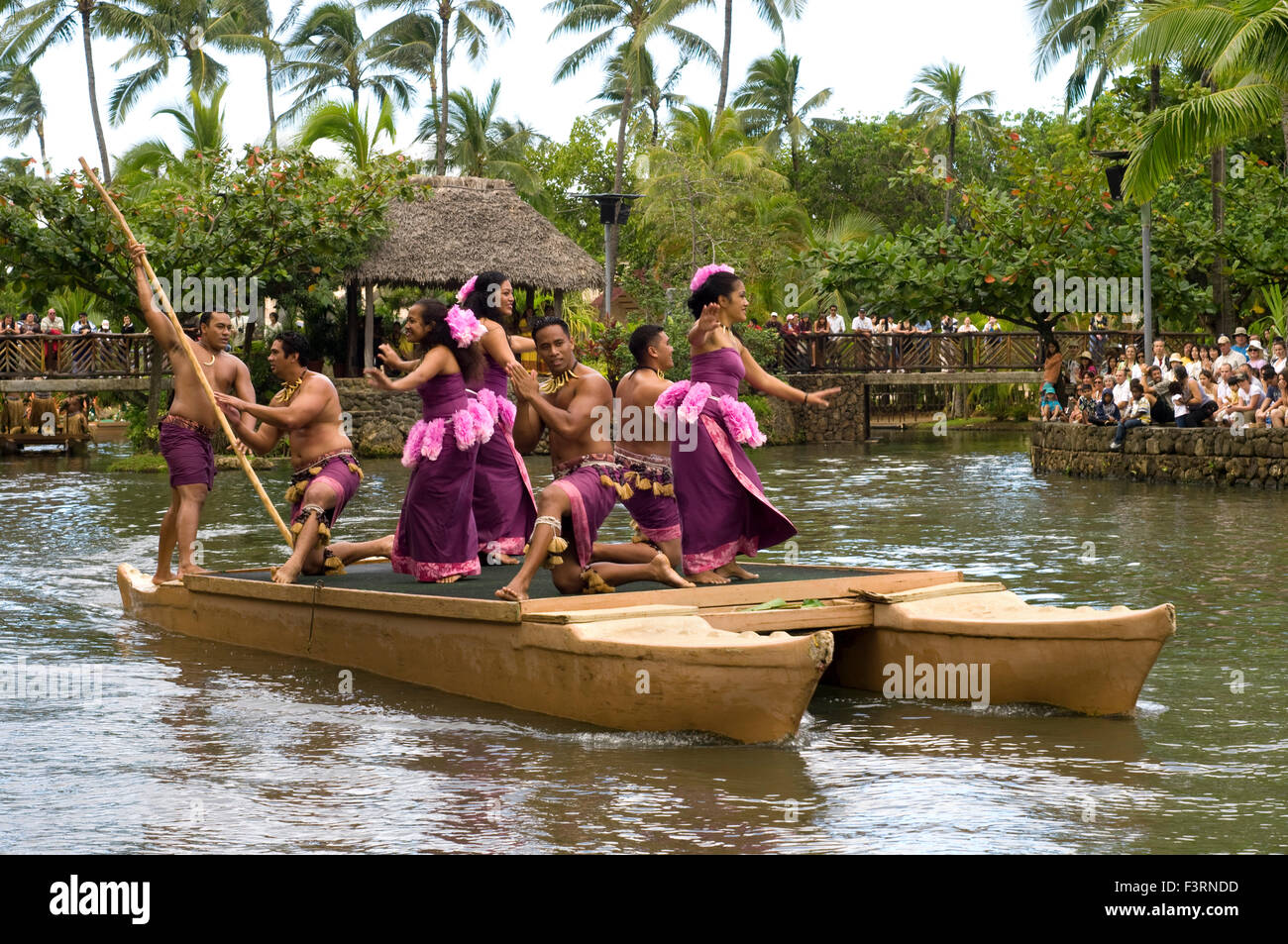 Central show in one of the lakes called Rainbown of Paradise where canoes parade singing songs, dances and martial arts in each Stock Photo