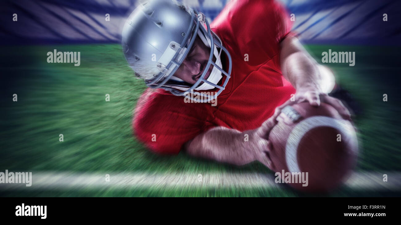 Composite image of sportsman struggling to catch the ball Stock Photo