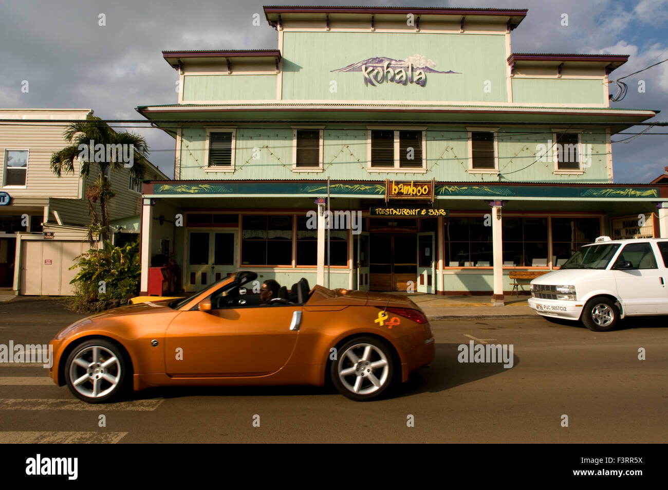 Kohala Bamboo Restaurant and Bar in Hawi. Nisan 370Z. Hawi is the most northern town. Wooden houses painted in bold colors trans Stock Photo