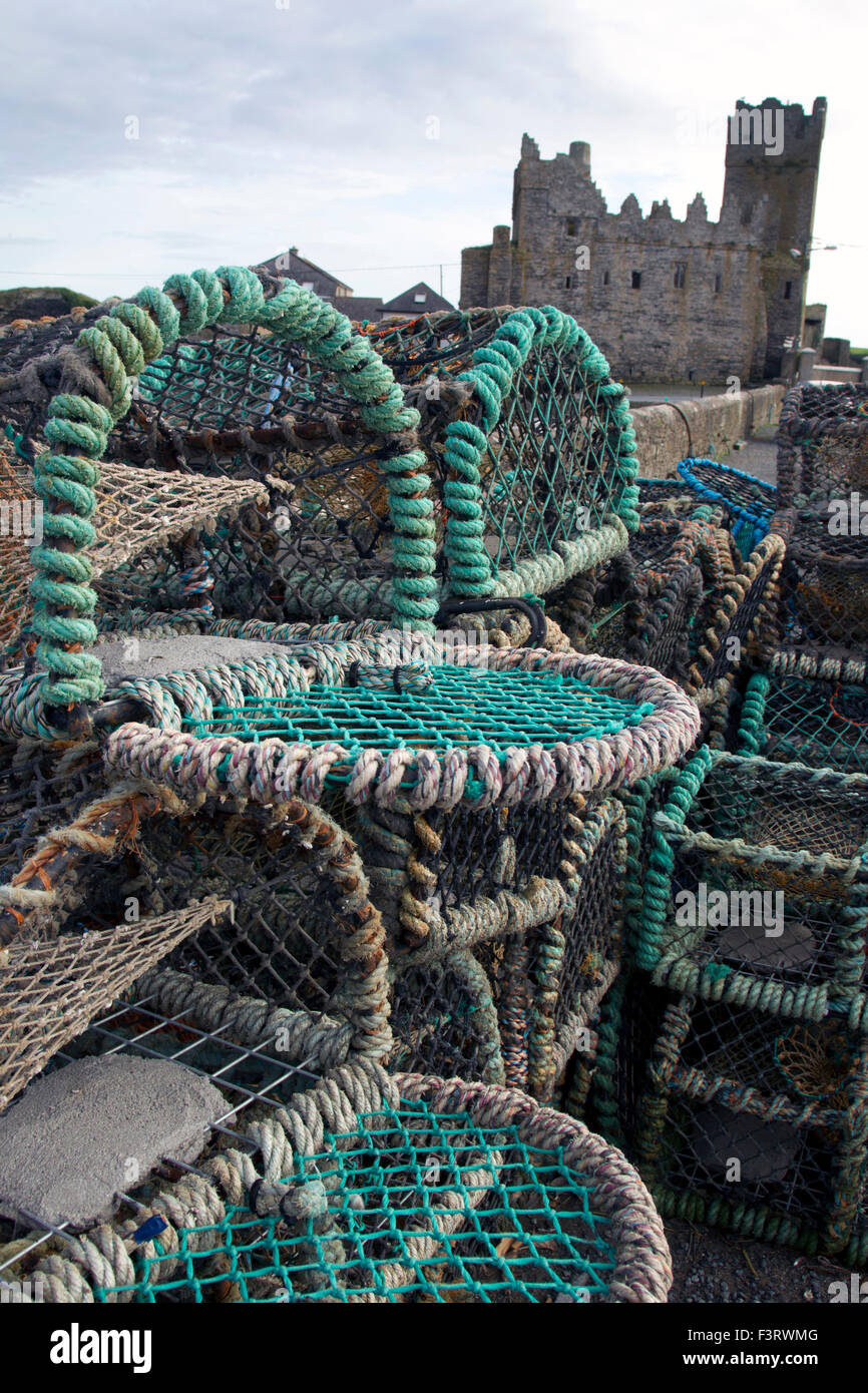 Lobster pots drying on Slade quay Stock Photo