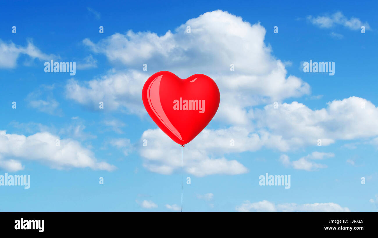 red heart shaped balloon in the sky. Stock Photo