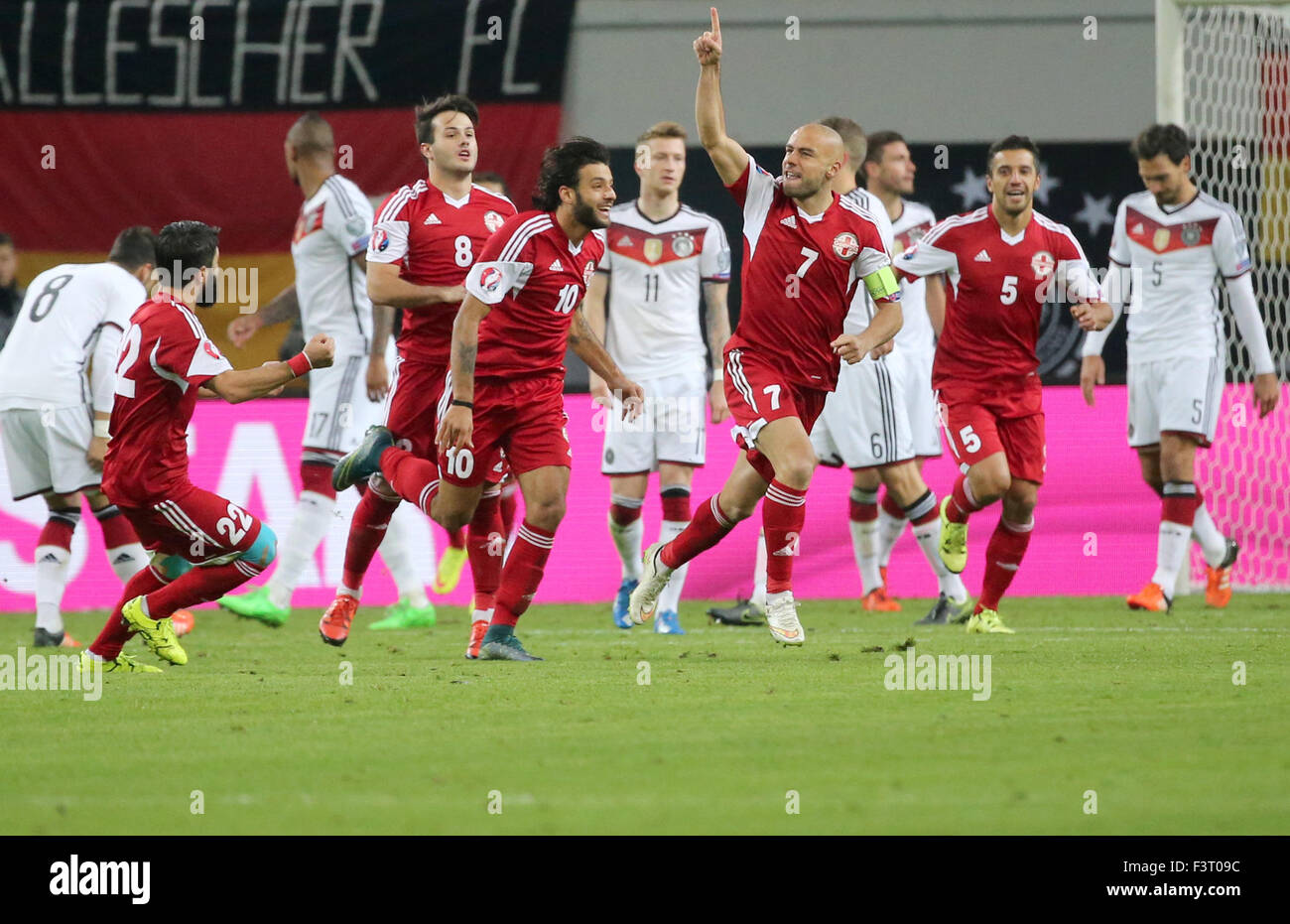 Leipzig, Germany. 11th Oct, 2015. Georgia's Jaba Kankawa (front R) celebrates his 1-1 with his team mates during the UEFA EURO 2016 qualification match between Germany and Georgia at Red Bull Arena in Leipzig, Germany, 11 October 2015. Photo: Jens Wolf/dpa/Alamy Live News Stock Photo