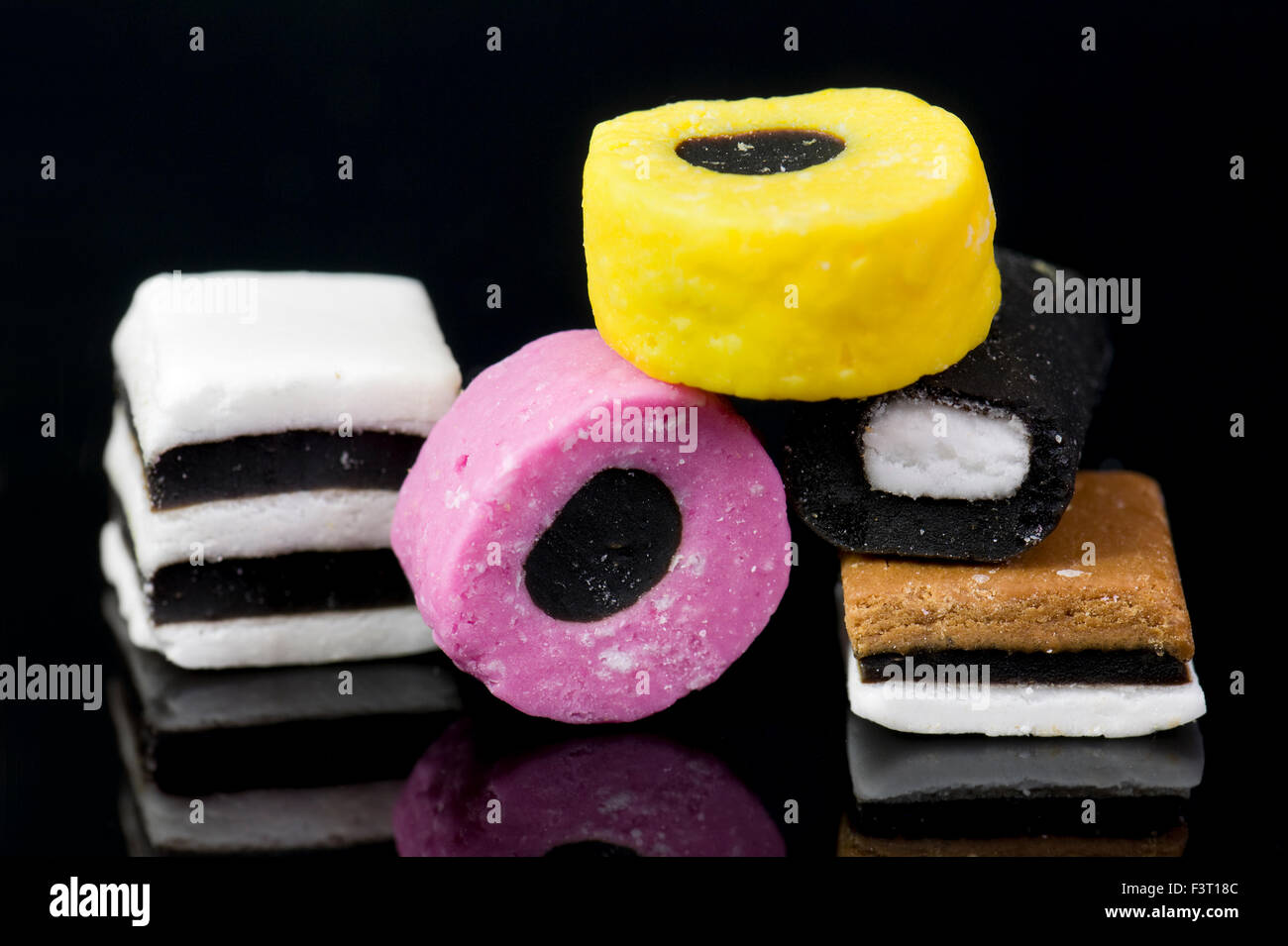 Pink and orange liquorice allsorts hires stock photography and images