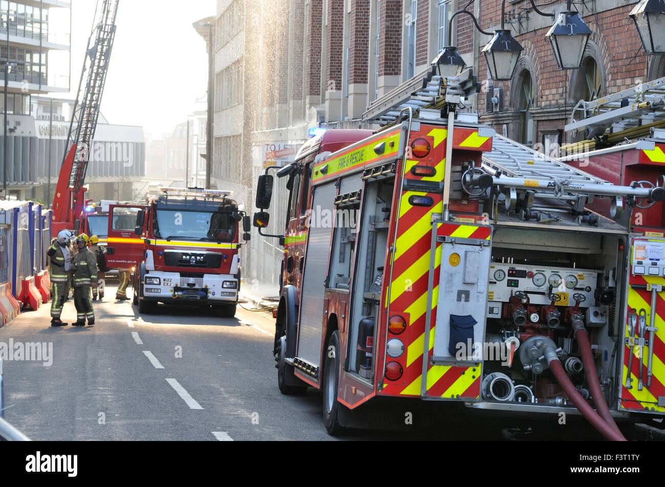 A major fire started about 13:00hr in University of Bristol Student accommodation, 33 Colston Street, Bristol, England, 12 October 2015, tackled by Avon Fire & Rescue services with two turntable ladder fire engines and more than four other engines. The location is between the Colston Hall and Griffin pub near the junction of Colston Street and Trenchard Street and these roads have been closed to both vehicles and pedestrians. The blaze has completely destroyed the whole length of roof and top floor.  Credit:  Charles Stirling/Alamy Live News Stock Photo