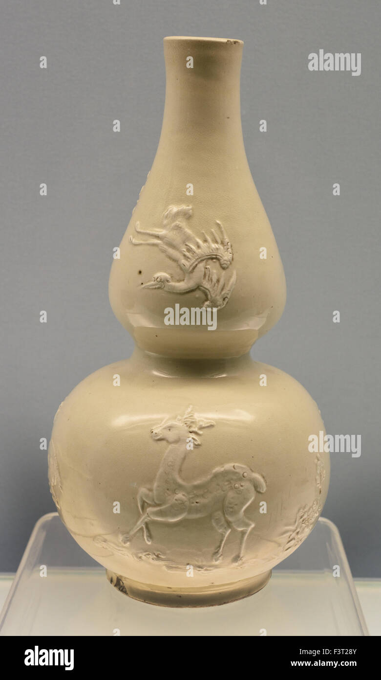 White glazed gourd shaped vase with applied design of pine tree Bamboo Plum  Blossom Crane and