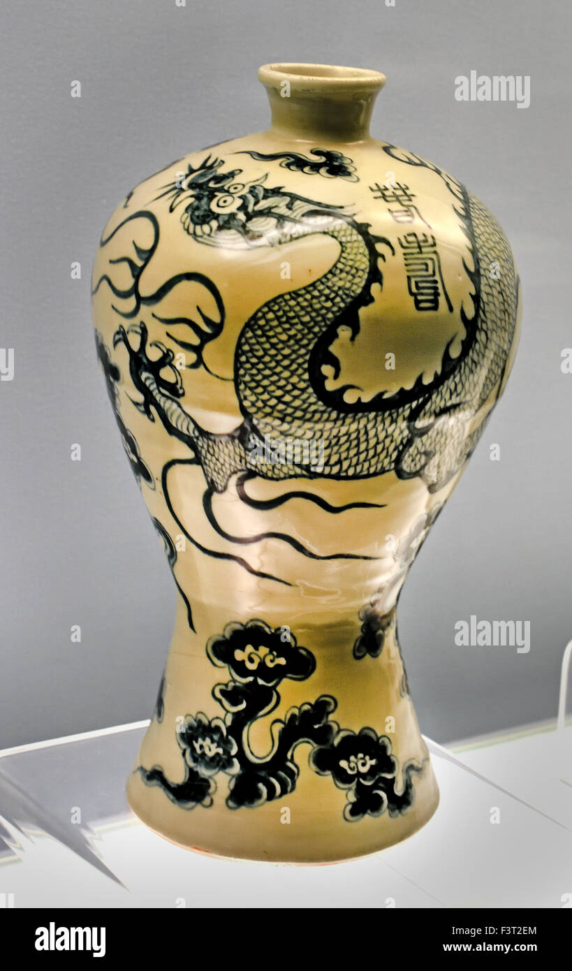 Vase with underglaze blue design of clouds and dragons and ( Chun Shou ) Jingdezhen ware Hongwu Reign Ming Dynasty 1368 - 1398 AD  Shanghai Museum of ancient Chinese art China Stock Photo