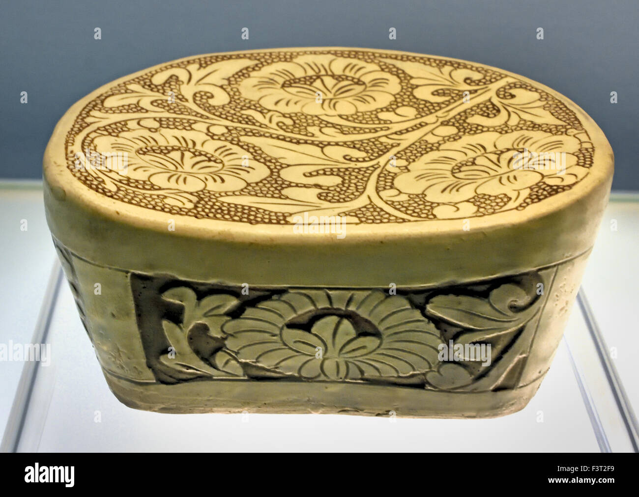 Pillow with incised peony design on pearl patterned ground Denfeng Ware 960 - 1279 AD Northern Song Dynasty ( Shanghai Museum of ancient Chinese art ) China Stock Photo