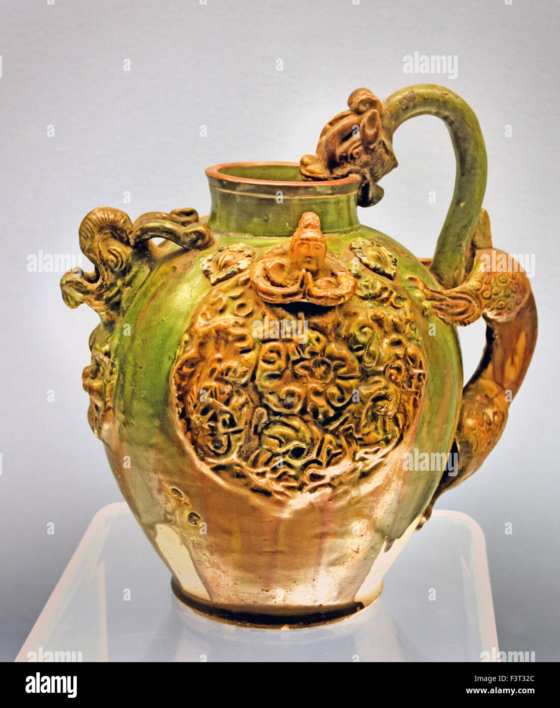 Polychrome Glazed Pottery Pitcher with a Dragon Head and applied design 618 - 907 AD Tang Han Dynasty ( Shanghai Museum of ancient Chinese art ) China Stock Photo