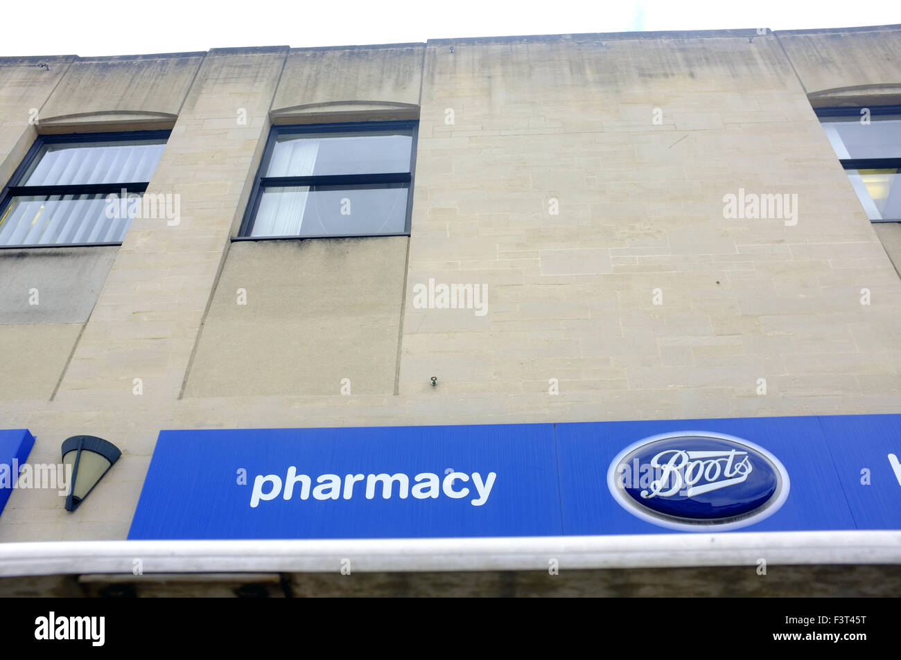 Looking up at a Boots Pharmacy shop in the Clifton area of Bristol Stock Photo Alamy