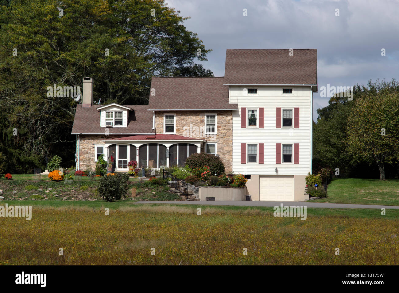 House home in a autumn fall setting. Stock Photo